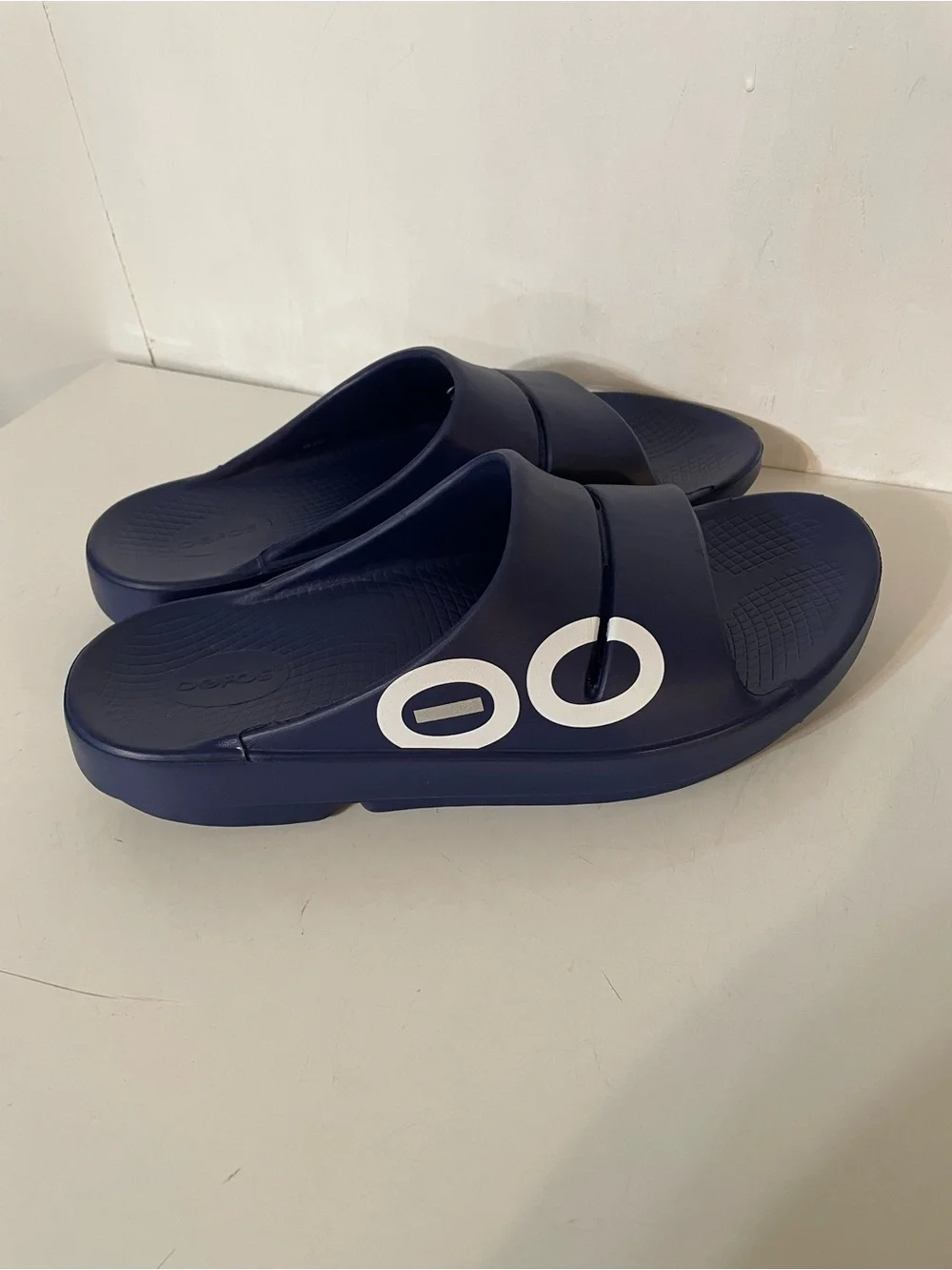 Oofos Slides in Navy Blue